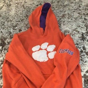 Clemson Boys Youth M.  Orange w/ White Paw Logo.  Purple interior hoodie.